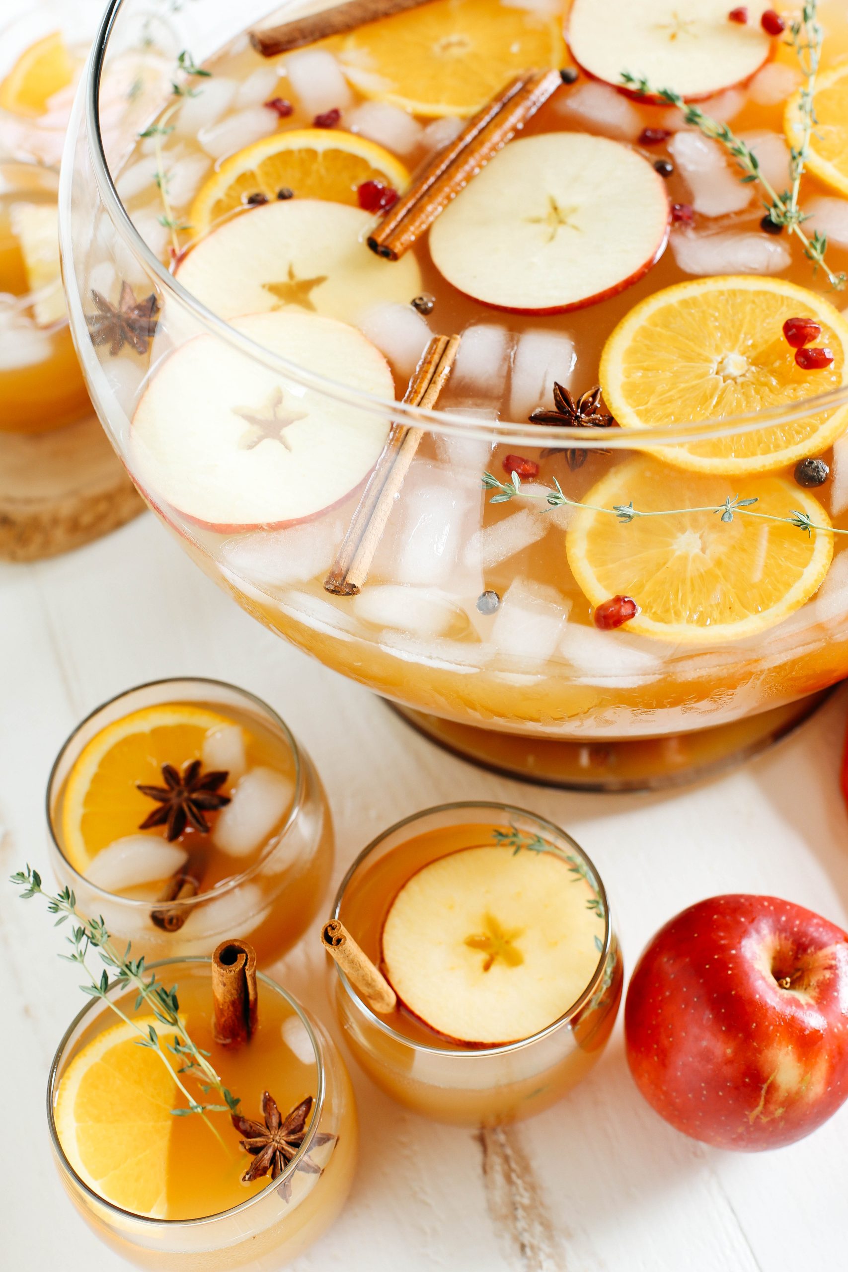 This Harvest Apple Cider Punch makes the perfect addition to any holiday party or gathering with a delicious combination of your favorite fall flavors all marinated together in one festive cocktail!