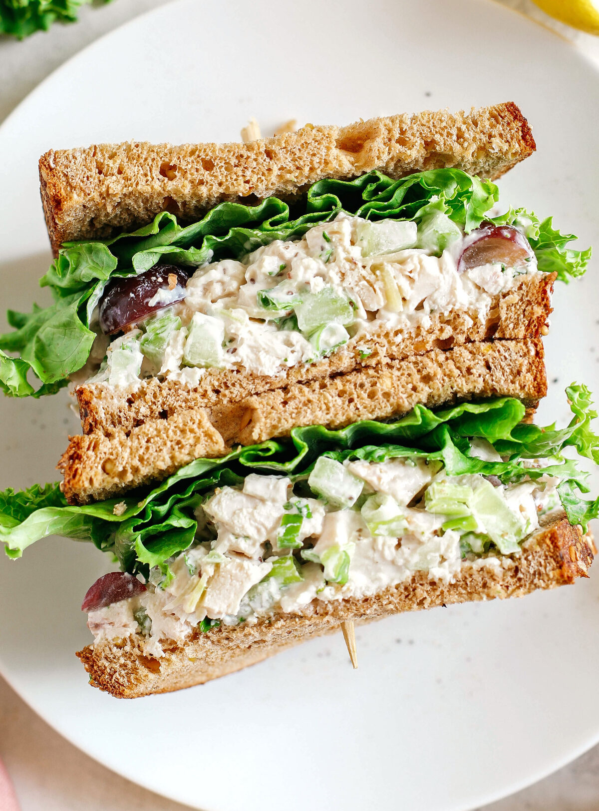 Healthy Chicken Salad made with tender chicken, Greek yogurt instead of mayo, crunchy celery, grapes, and sliced almonds for a delicious spin on a classic favorite!