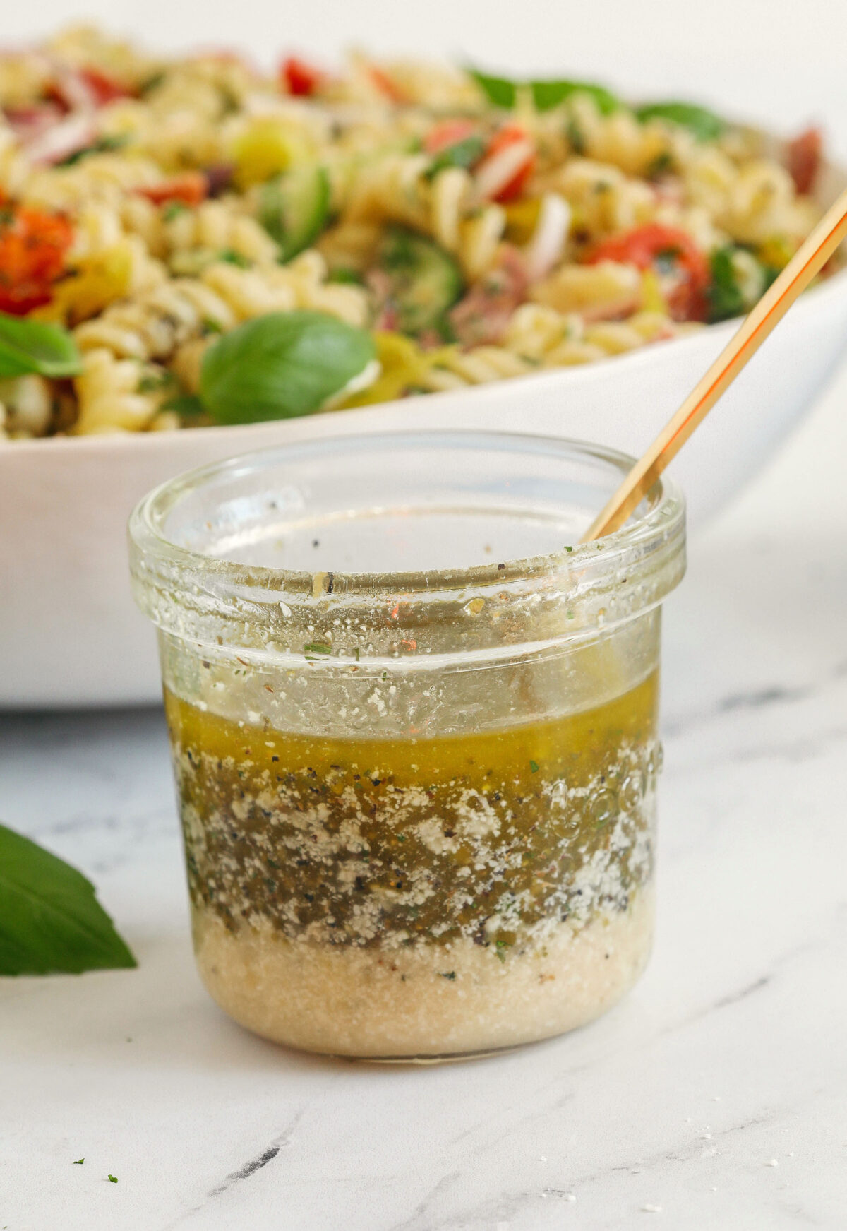 You'll love this zesty homemade Easy Italian Dressing made in just minutes with a few simple pantry ingredients!  Perfect for salads, veggies, marinades, and more!